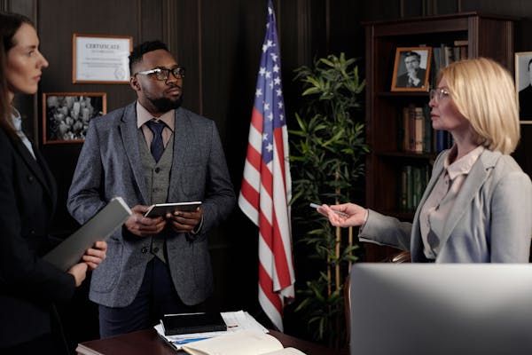 Client consulting with bankruptcy lawyer about debt relief options