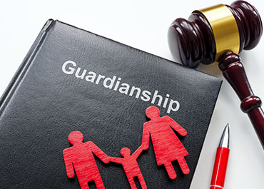 Guardianship book with gavel and family cutout, symbolizing emergency guardianship